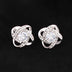 Elevate Your Style with Love Knot 14k White Gold Stud Earrings Over Stainless Steel